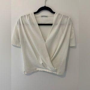 Deep-V white blouse